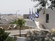 Three Flags and a Security Barrier