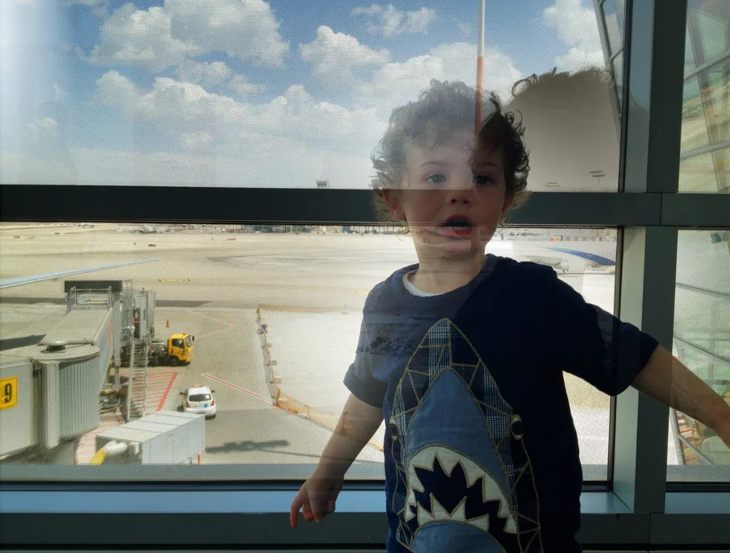 Eden at the airport tarmac window