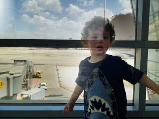 Eden at the airport tarmac window